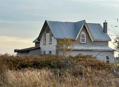 102 ac Farm Lands with 2 houses, a building and 10,000 sf greenhouse